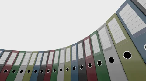 Colorful office binders rotate, low angle wide shot. 4K seamless loop able Stock Footage