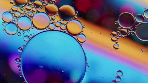 Colorful Oil Bubbles Moving on a Water Surface Stock Footage 285464853