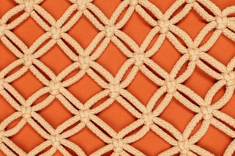 A colorful orange pattern background. Textile wallpaper A colorful orange ... Stock Photos