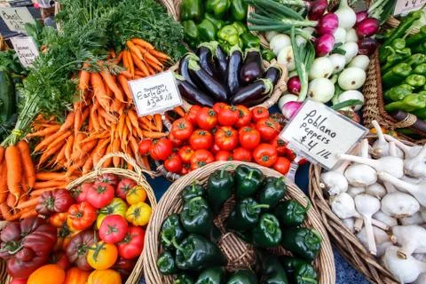 Colorful organic vegetables at a local farmers market. Stock Photos