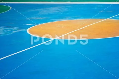 Colorful outdoor basketball court Stock Photos