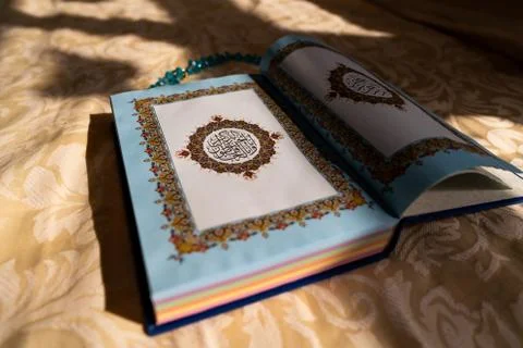 Colorful pages of the holy Quran book (Koran) | Ramadan Kareem and Eid Mubarak Stock Photos