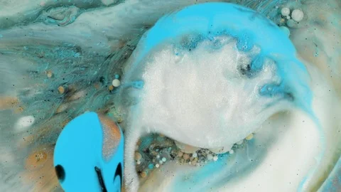 Colorful paint in bubbles organically moves in the liquid Stock Footage 100723701