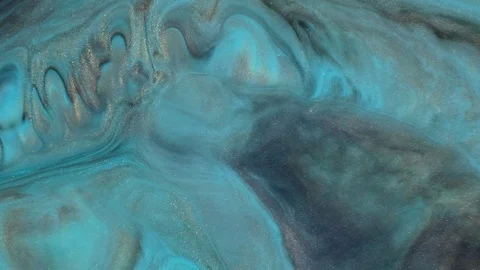 Colorful paint with silver particles organically moves in the liquid Stock-Footage 100766302
