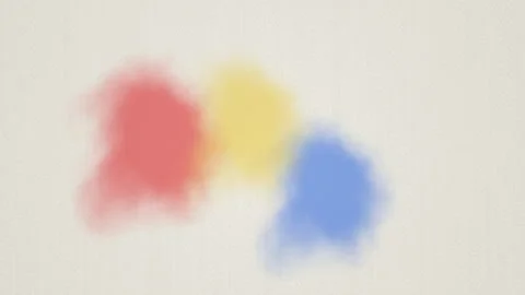 Colorful paint splashes on a light background create a Stockbeeldmateriaal 338195606