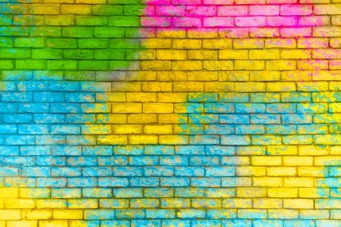 Colorful painted brick wall texture background. Graffiti brick wall, colorf.. Illustrazione stock