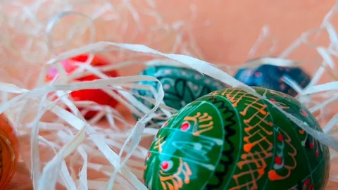 Colorful painted easter eggs among straw Stock Footage 103847118