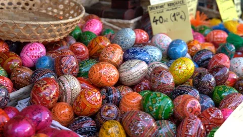 Colorful painted easter eggs in basket at the traditional European market. Stock Footage 125901641