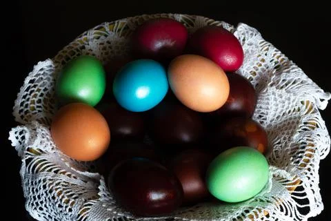 Colorful painted easter eggs on white lace Stock Photos