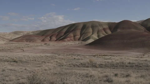 Colorful Painted Hills with Dramatic shadows, Static wide shot Stock Footage 332237878