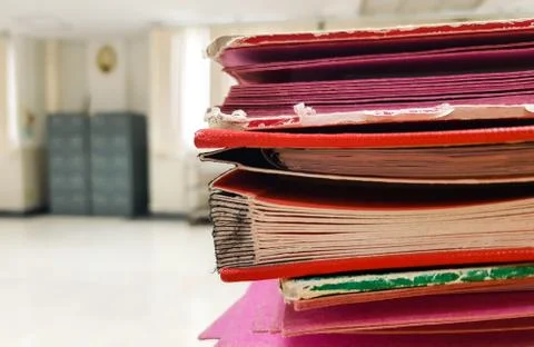 Colorful paper document folder on office background. Stock Photos