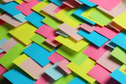 Colorful paper notes as background, closeup view Foto stock