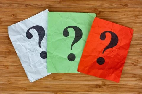 Colorful paper notes with question marks Stock Photos