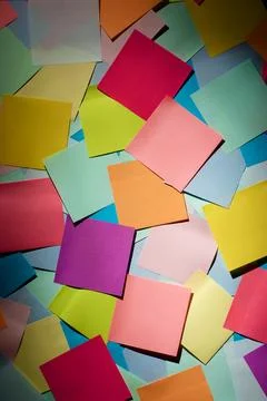 Colorful paper notes on a table Fotos de archivo