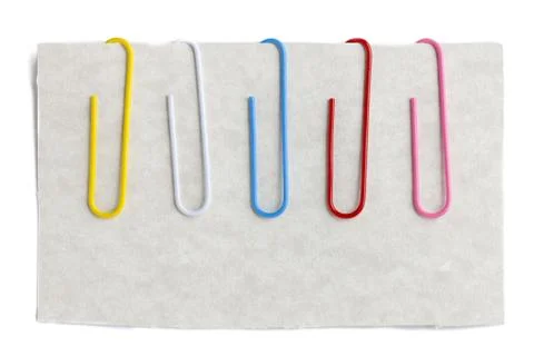 Colorful paperclips on note Stock Photos