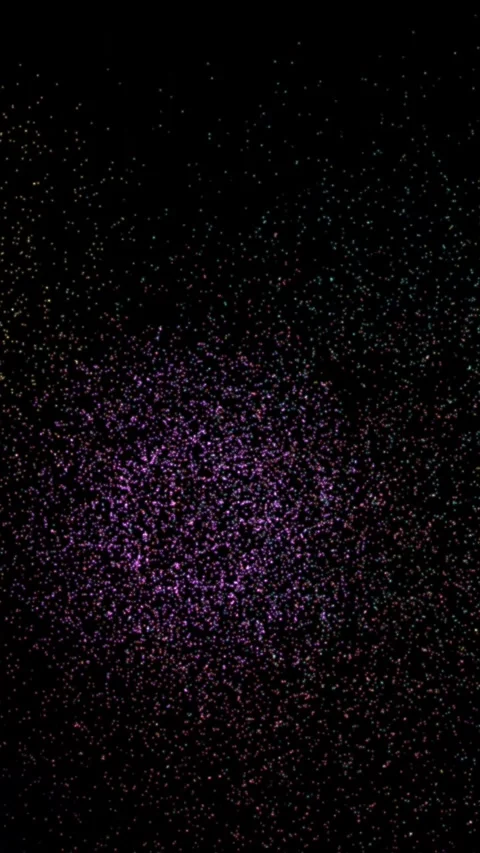 Colorful Particle Fireworks Exploding Against a Dark Night Sky Background Stock Footage 328487105