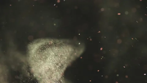 The colorful particles floating on the dark background. slow motion Stock Footage 160062247