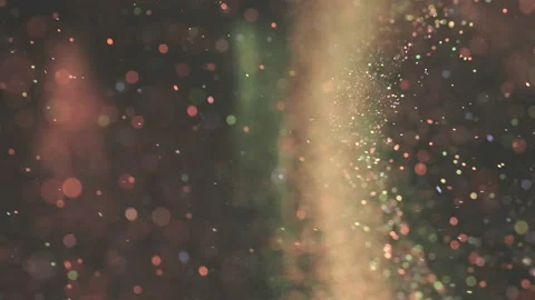 The colorful particles floating on the dark background. slow motion Stock Footage 160062485