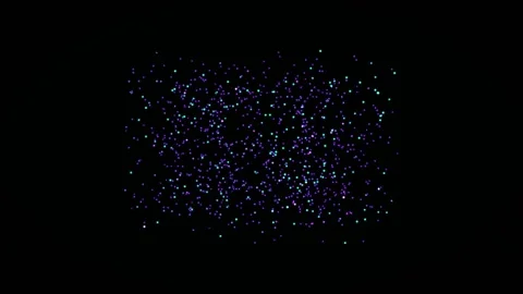 Colorful particles move in random patterns across a dark Stock Footage 340043816