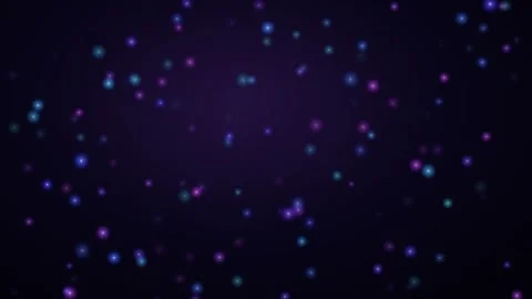 Colorful particles move in space against a dark background Stock Footage 337233684