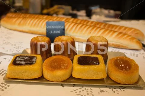 Colorful pastries with f cream and chocolate, the real french confectionery Stock Photos