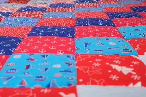 Colorful patchwork quilt, closeup of a patchwork quilt Stock Photos