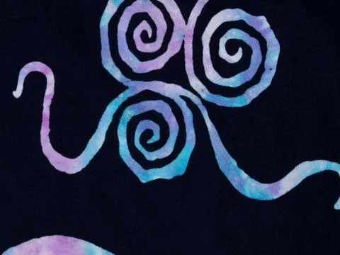 Colorful pattern on black fabric batik as background Stockfoto's