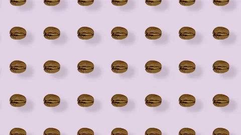 Colorful pattern of coffee beans on pink background with shadows. Seamless Stock Footage 167487072