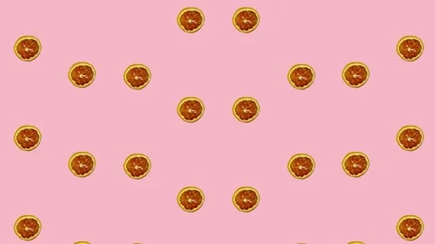 Colorful pattern of dried grapefruit slices on pink background. Seamless pattern 動画素材 167475976