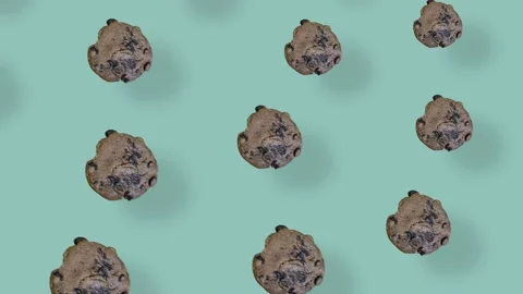 Colorful pattern of fresh chocolate chip cookies. Seamless pattern with cookie Stock Footage 167486936