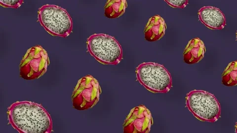 Colorful pattern of fresh dragon fruit on violet background. Seamless pattern Stock Footage 167487519