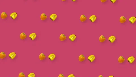 Colorful pattern of fresh orange persimmons on pink background. Top view Stock Footage 167484199