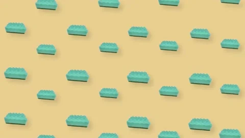Colorful pattern of green kitchen sponges on orange background. Seamless pattern Stock Footage 167486099