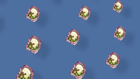 Colorful pattern of japanese sushi rolls on blue background with shadows Stock Footage 167486576