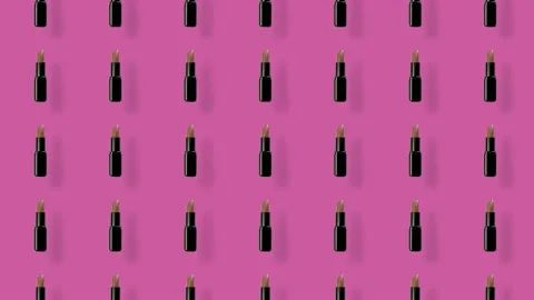 Colorful pattern of lipsticks on pink background with shadows. Seamless pattern Video stock 167486226
