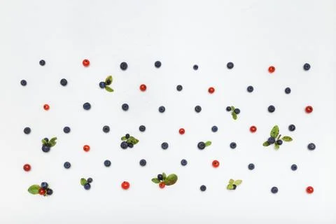 Colorful pattern made of blueberries and currents. Stock Photos