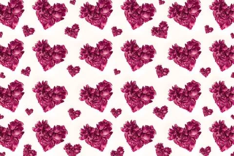 Colorful pattern of many flower petals in shape of pastel pink hearts. Stock Photos