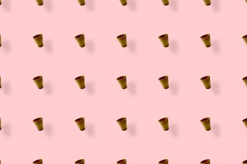 Colorful pattern of paper drinking cups on pink background with shadows. Top Stock Photos