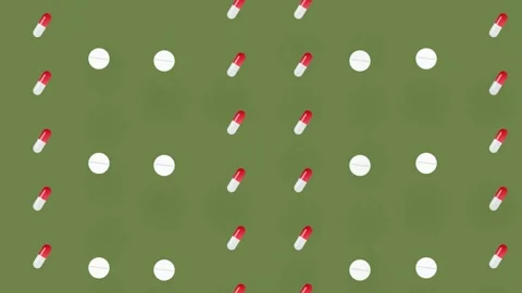 Colorful pattern of pills and capsules on green background. Seamless pattern Stock Footage 169239204