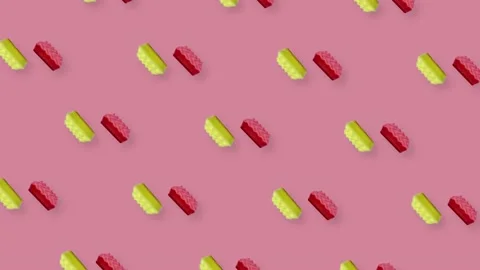 Colorful pattern of pink and yellow kitchen sponges on pink background. Seamless Stock Footage 167484028