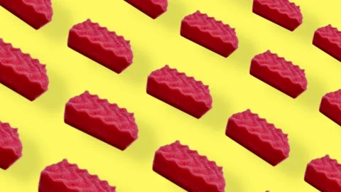 Colorful pattern of pink kitchen sponges on yellow background with shadows Stock Footage 167487726