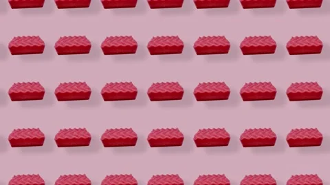 Colorful pattern of pink kitchen sponges. Seamless pattern with sponge. Top view Stock Footage 167488035