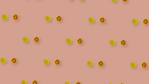 Colorful pattern of rotating dried grapefruits and oranges slices on pink Stock Footage 167484081