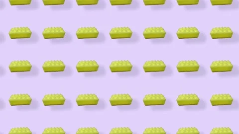 Colorful pattern of yellow kitchen sponges on purple background with shadows Stock Footage 167479091