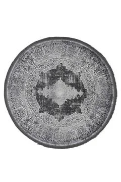 Colorful patterned circle carpet on a white background Stock Photos