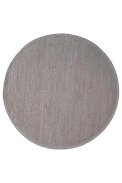 Colorful patterned circle carpet on a white background Stock-Fotos