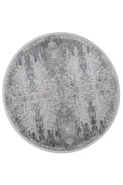 Colorful patterned circle carpet on a white background Stock Photos