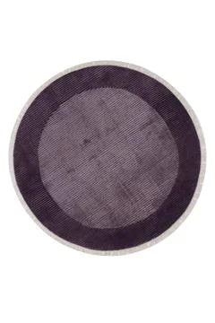 Colorful patterned circle carpet on a white background Stock Photos