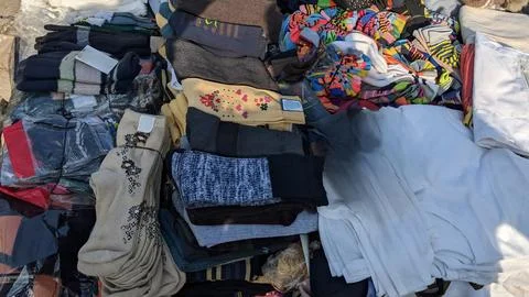Colorful Patterned Socks and Textile Display at Outdoor Market Фото