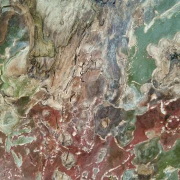 Colorful peeling tree bark texture green red brown organic hues Stock Photos